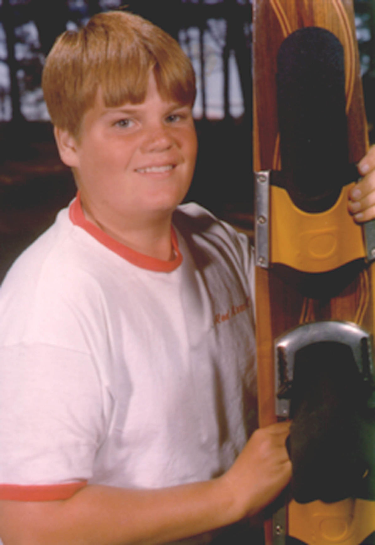 Young Chris Farley with water skis
